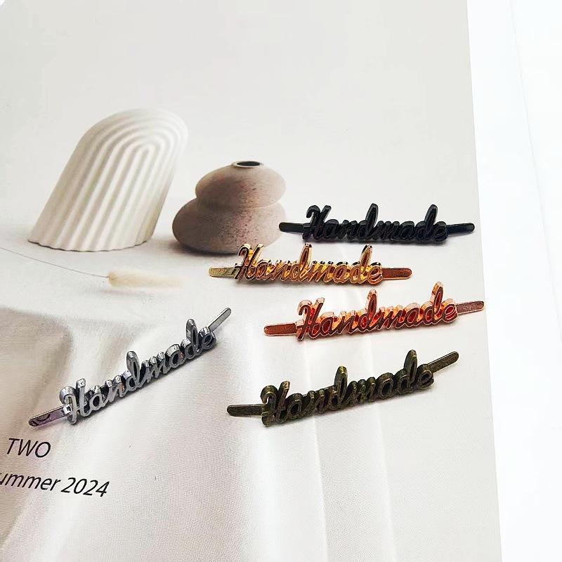 Handgemaakte metalen labels me - Sewing Label recensie en prijs
